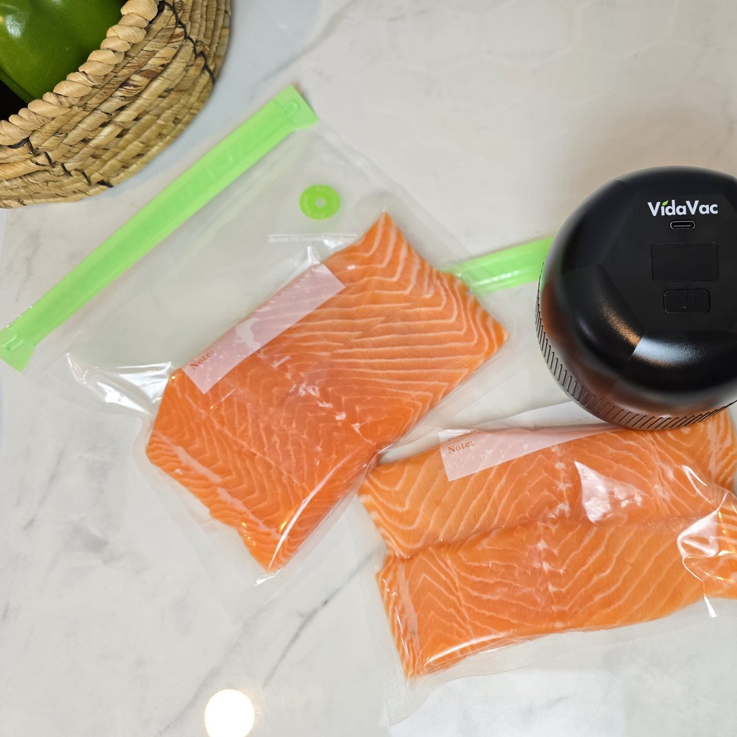 Vacuum sealing Salmon in reusable zip bag using VidaVac sealer
