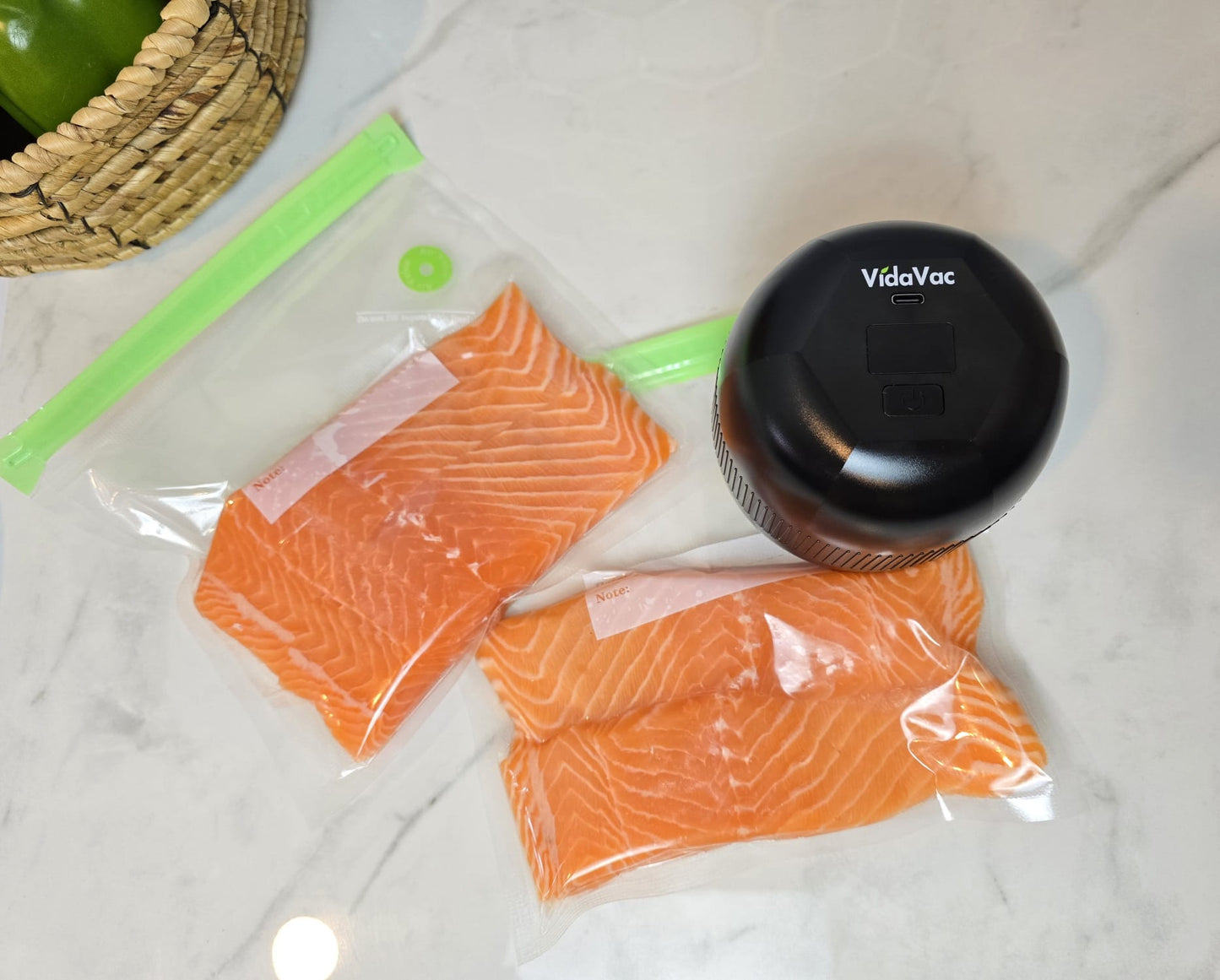 Vacuum sealing salmon fillet in a reusable vacuum seal bag with VidaVac