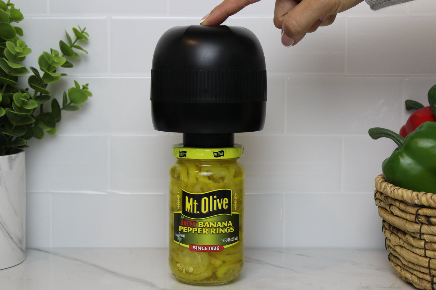 Vacuum sealing a twist lid jar using VidaVac hole punch and silicone umbrella system